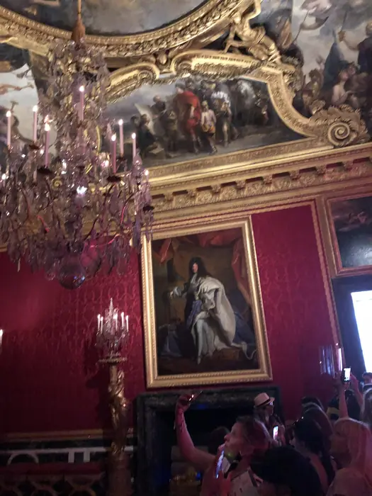 Crimson, crystal and a painted ceiling — the Grand Apartment.
